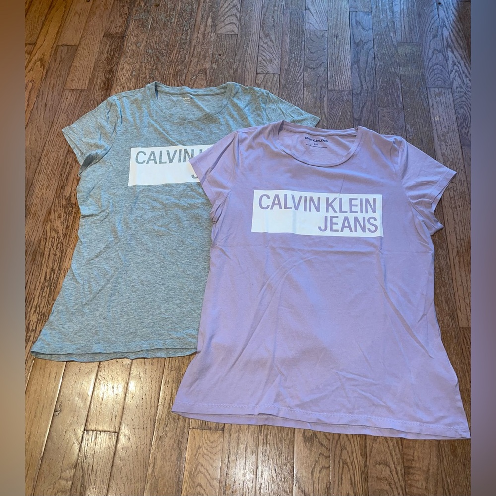 pair of calvin klein t-shirts